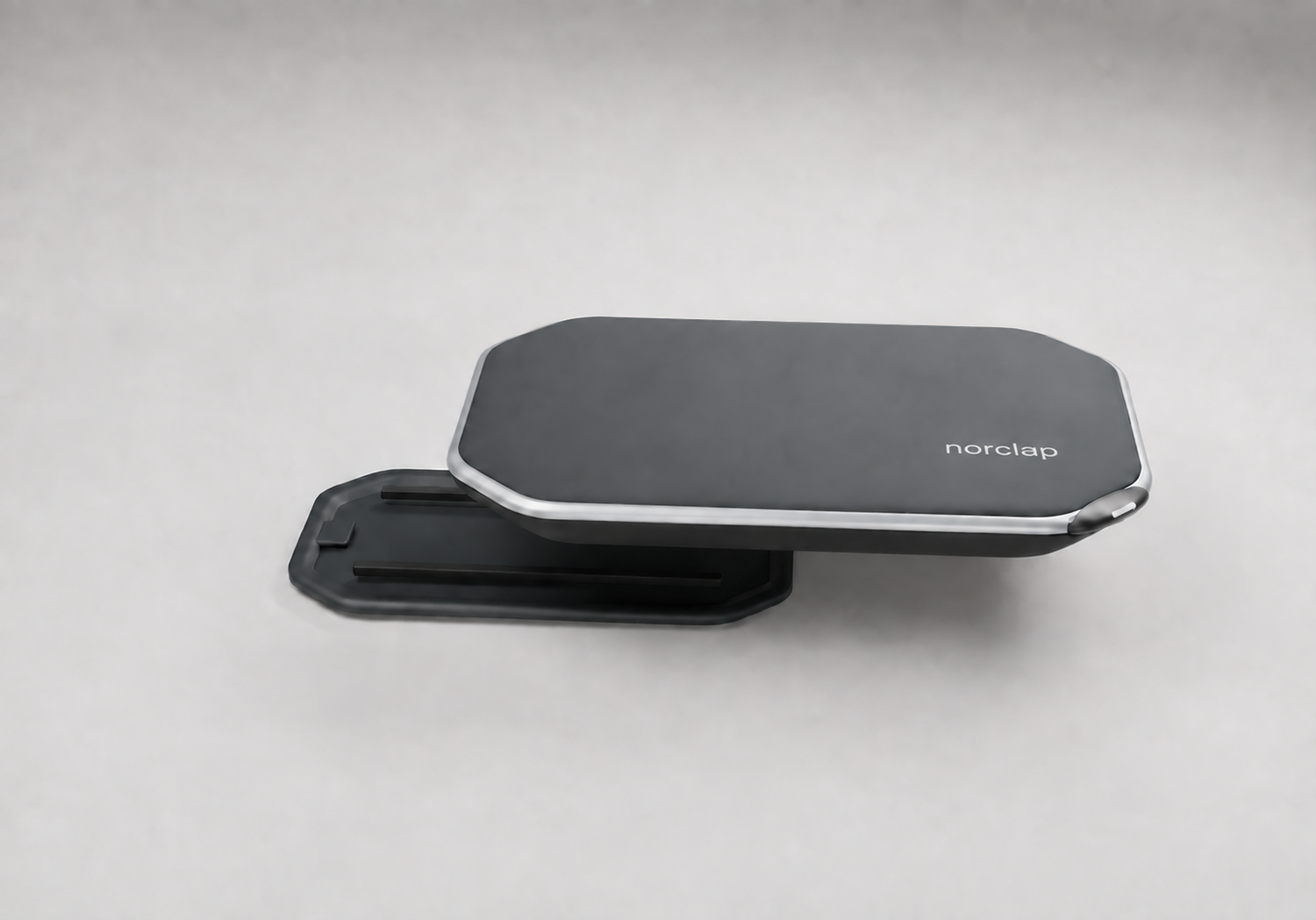 The slim graphite STRATA model separated from its matching sliding helmet dock